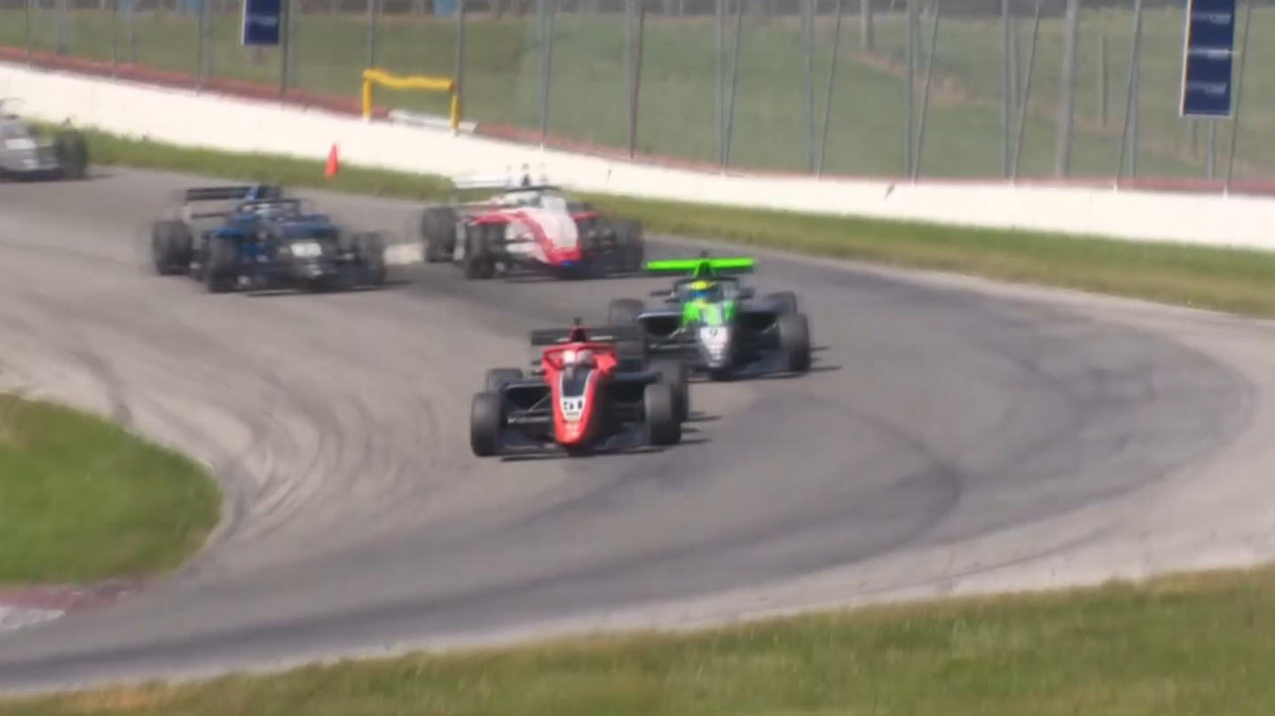 Jacob Abel fends off Joshua Car in a tense final scramble in Lexington. (SVRA)