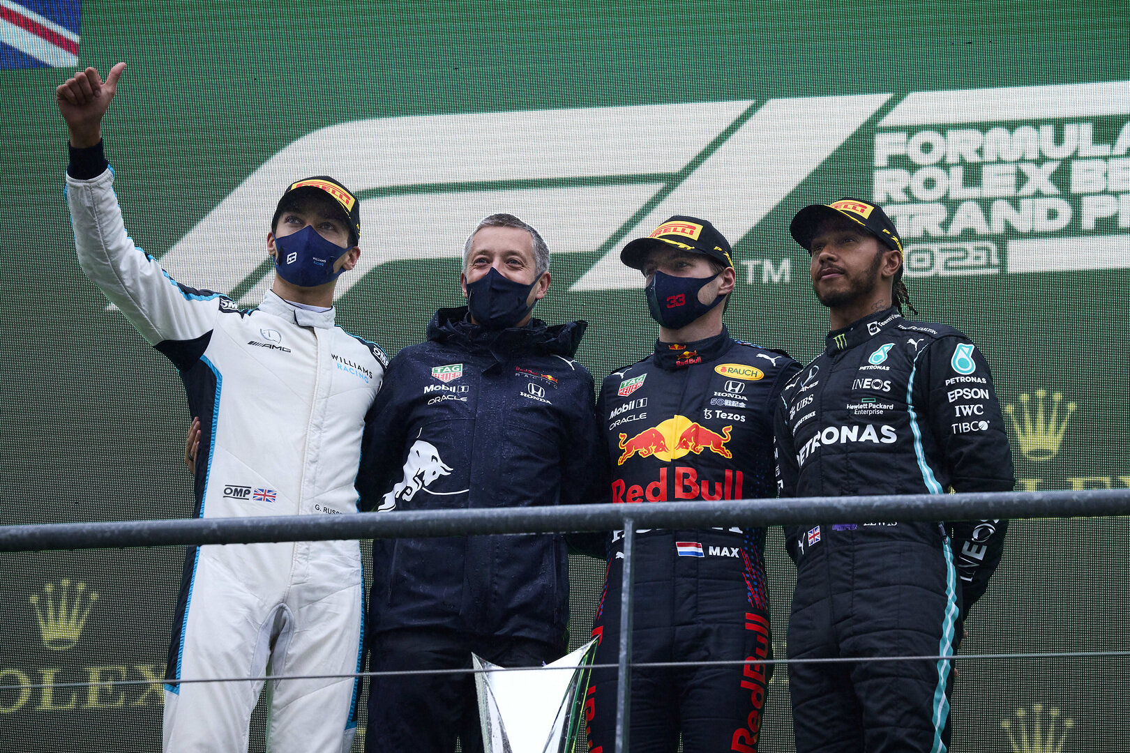 Max Verstappen, George Russell, and Lewis Hamilton on the podium. (Steve Etherington)